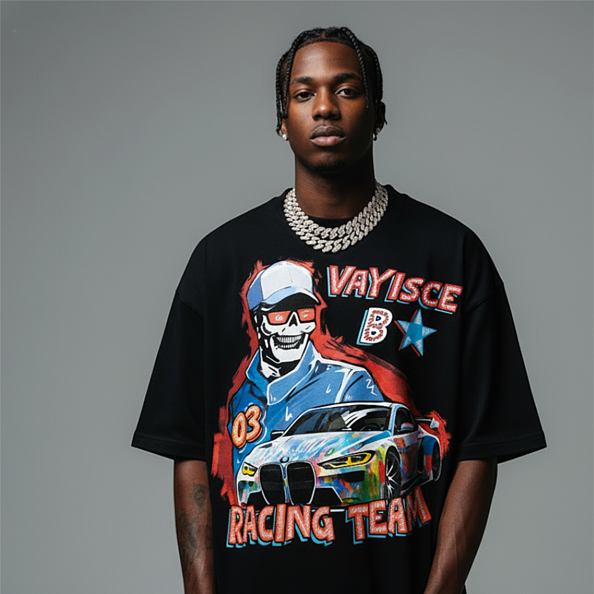 Person wearing a black t-shirt with a colorful graphic design on a gray background