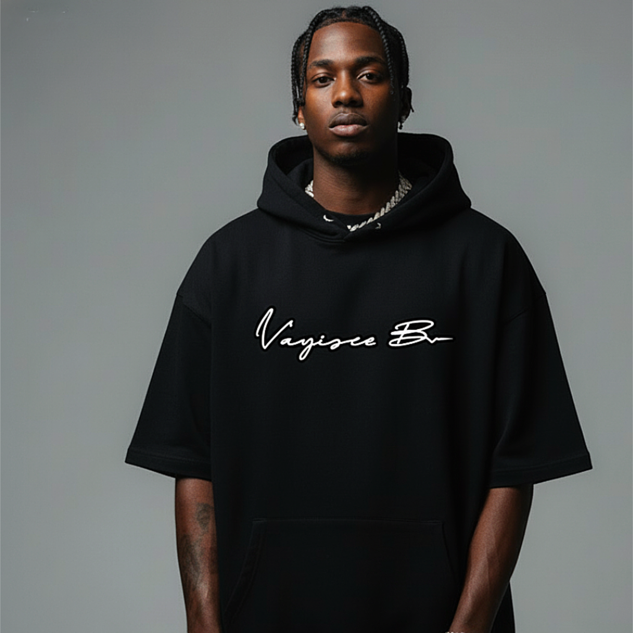 Person wearing a black hoodie with 'Vayisce B' text 